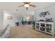 Spacious living area with a modern bar, comfortable seating, and seamless flow to other areas at 1334 Via Milanese, Punta Gorda, FL 33950