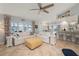 Open-concept living area with a seamless flow between the living room, dining area, and kitchen at 1334 Via Milanese, Punta Gorda, FL 33950