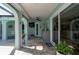 A cozy patio area with a built-in cabinet and wine cooler at 1334 Via Milanese, Punta Gorda, FL 33950
