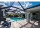 Inviting screened-in pool area with comfortable seating and a spacious deck for relaxing and entertaining at 1334 Via Milanese, Punta Gorda, FL 33950