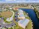 Aerial view of canal-front condos with convenient parking and easy access to waterways at 1344 Rock Dove Ct # D102, Punta Gorda, FL 33950