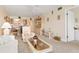 Open floor plan with a view from the living room into the dining room at 1344 Rock Dove Ct # D102, Punta Gorda, FL 33950