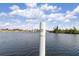 Water view of the lake, with a dock, perfect for boating and enjoying waterfront living at 1344 Rock Dove Ct # D102, Punta Gorda, FL 33950