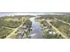 Scenic aerial view of waterway homes, showcasing waterfront living and community charm at 1417 Carswell St, Port Charlotte, FL 33953