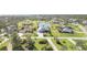 Aerial view of the neighborhood highlighting lush landscaping and ponds at 1417 Carswell St, Port Charlotte, FL 33953