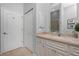 Bathroom featuring a sink with marble countertop, vanity, mirror, and lots of storage at 1417 Carswell St, Port Charlotte, FL 33953