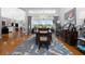 Elegant dining room with pool views and an open-concept layout for entertaining at 1417 Carswell St, Port Charlotte, FL 33953