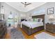 Spacious main bedroom boasts hardwood floors and access to the pool area at 1417 Carswell St, Port Charlotte, FL 33953