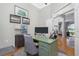 Bright office features desk, neutral colors and view of main house at 1417 Carswell St, Port Charlotte, FL 33953