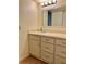 Bright bathroom with a modern vanity, countertop, and updated fixtures at 175 Kings Hwy # A3-513, Punta Gorda, FL 33983