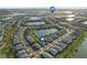 Aerial view of a residential area near a large lake at 17917 Wayside Bnd, Punta Gorda, FL 33982
