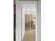 Bathroom view framed by doorway showing large shower and bathtub at 17917 Wayside Bnd, Punta Gorda, FL 33982