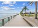 Scenic boardwalk view with lush greenery, palm trees, and a serene waterfront backdrop at 17917 Wayside Bnd, Punta Gorda, FL 33982