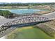 Aerial view of a bridge over a water feature, surrounded by lush green landscape at 17917 Wayside Bnd, Punta Gorda, FL 33982