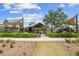 Shaded pavilion with playground and barbecue situated in a manicured community green space at 17917 Wayside Bnd, Punta Gorda, FL 33982