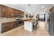 Modern kitchen featuring granite countertops, stainless steel appliances, and ample cabinet space at 17917 Wayside Bnd, Punta Gorda, FL 33982