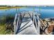 Picturesque waterfront bridge with metal railings and a serene view of the water and surrounding landscape at 17917 Wayside Bnd, Punta Gorda, FL 33982