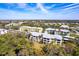 Community aerial view, landscaped grounds, and multiple residential buildings at 2081 Willow Hammock Cir # F101, Punta Gorda, FL 33983