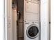Efficient laundry area with stacked washer and dryer, maximizing space at 2081 Willow Hammock Cir # F101, Punta Gorda, FL 33983