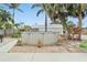 Backyard features above ground pool and landscaping at 23475 Harper Ave, Port Charlotte, FL 33980