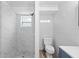 Tiled shower and vanity with great lighting at 23475 Harper Ave, Port Charlotte, FL 33980