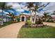 Charming single-Gathering home with a paved driveway and lush tropical landscaping at 24362 Peppercorn Rd, Punta Gorda, FL 33955