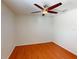 Bedroom featuring wood floors and ceiling fan with light at 399 Bal Harbor Blvd, Punta Gorda, FL 33950