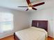 Bedroom featuring a ceiling fan and window with a view at 399 Bal Harbor Blvd, Punta Gorda, FL 33950