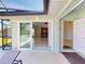 View from patio of open sliding door to bright living area at 399 Bal Harbor Blvd, Punta Gorda, FL 33950