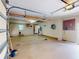 Spacious garage with ample storage space and access to the home's interior at 399 Bal Harbor Blvd, Punta Gorda, FL 33950