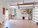 The garage is well-equipped with storage shelving, cabinets, and a workbench at 399 Bal Harbor Blvd, Punta Gorda, FL 33950