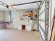 Garage features a workbench, storage shelves, and an automatic garage door opener at 399 Bal Harbor Blvd, Punta Gorda, FL 33950