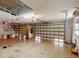 This garage boasts several storage solutions, including overhead racks and shelving at 399 Bal Harbor Blvd, Punta Gorda, FL 33950