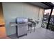 Outdoor kitchen features a built-in grill and sink, perfect for entertaining at 399 Bal Harbor Blvd, Punta Gorda, FL 33950