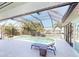 A screened-in pool with ample lounge space offers a luxurious outdoor retreat at 399 Bal Harbor Blvd, Punta Gorda, FL 33950