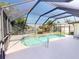 Enjoy a relaxing swim in this private screened in pool with scenic water views at 399 Bal Harbor Blvd, Punta Gorda, FL 33950
