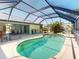 Inviting screened-in pool with outdoor seating area and sun loungers at 399 Bal Harbor Blvd, Punta Gorda, FL 33950