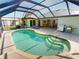 Relaxing screened pool and patio that combines indoor comfort with outdoor enjoyment at 399 Bal Harbor Blvd, Punta Gorda, FL 33950