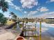 Waterfront with a boat lift offers direct access to open water for boating and recreation at 399 Bal Harbor Blvd, Punta Gorda, FL 33950