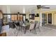 Enjoy the tile floors, ceiling fans, and comfortable seating in this enclosed lanai at 611 Bal Harbor Blvd, Punta Gorda, FL 33950