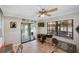 Bright living room featuring sliding glass doors leading to the outdoor pool area at 611 Bal Harbor Blvd, Punta Gorda, FL 33950