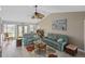 Comfortable living room with tile floors, light-colored walls, and large windows for ample natural light at 611 Bal Harbor Blvd, Punta Gorda, FL 33950