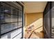 Cozy screened porch with bench, neutral decor, and sun-drenched ambiance at 611 Bal Harbor Blvd, Punta Gorda, FL 33950