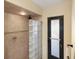 Modern shower with glass block partition and updated fixtures at 611 Bal Harbor Blvd, Punta Gorda, FL 33950