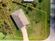 Aerial shot with property boundary lines, and spacious lawn at 616 Posadas Cir, Punta Gorda, FL 33983