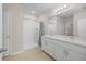 Bathroom with a walk-in shower, double sinks and vanity at 616 Posadas Cir, Punta Gorda, FL 33983