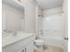 Bathroom with bathtub and shower, with a toilet and vanity at 616 Posadas Cir, Punta Gorda, FL 33983