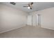 Spacious carpeted bedroom with ample closet space and neutral walls at 616 Posadas Cir, Punta Gorda, FL 33983