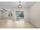 Bright living area with sliding glass doors leading to outdoor patio at 616 Posadas Cir, Punta Gorda, FL 33983