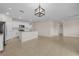 Open concept: view of kitchen with island connected to large living area at 616 Posadas Cir, Punta Gorda, FL 33983